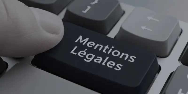 Clavier avec une touche mentions légales pour la conformité de bline design à Lille
